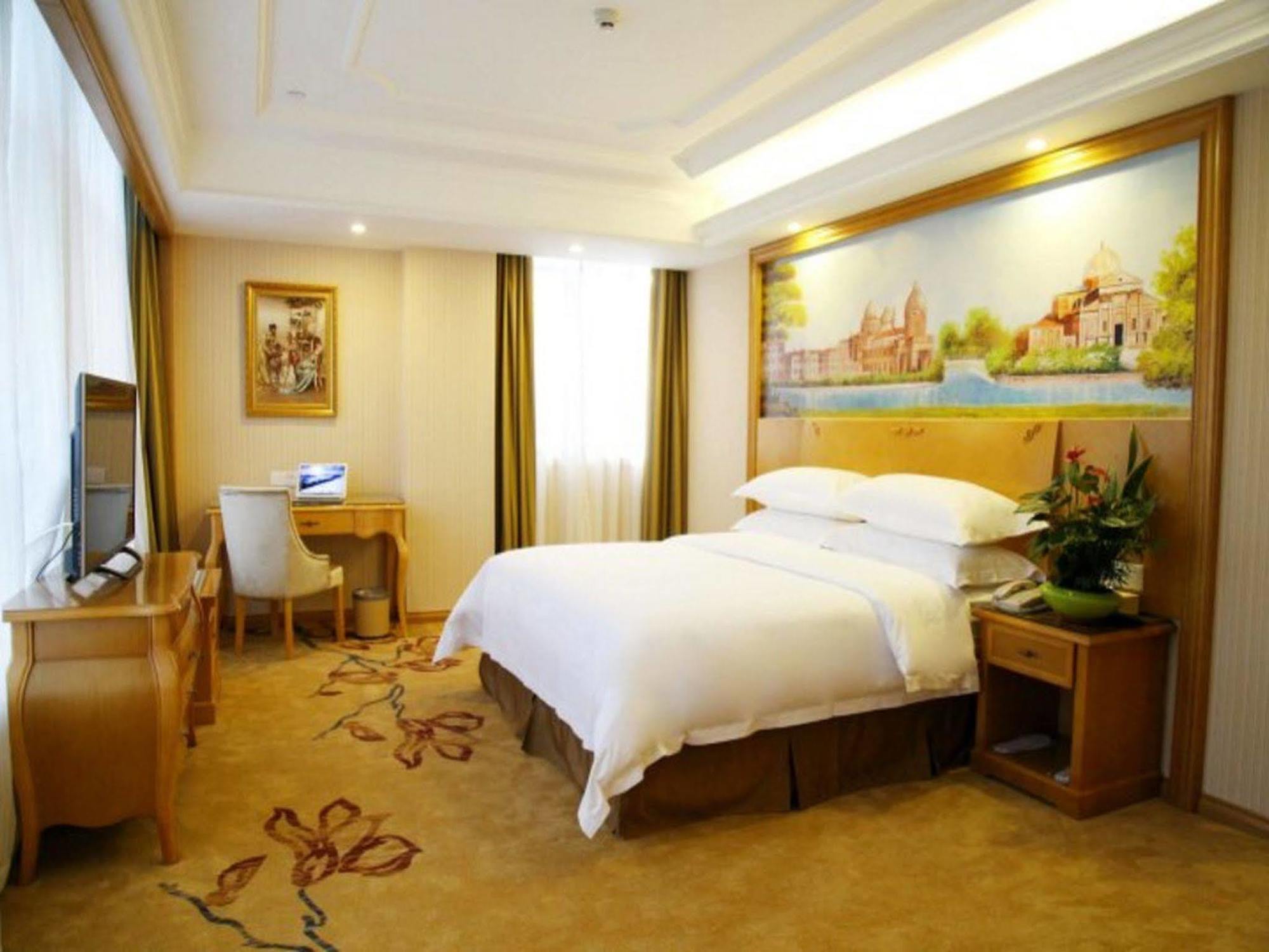 Vienna International Hotel Meizhou Spindle Bridge Branch Экстерьер фото